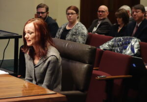 Lincoln resident Amanda Gerson told the committee she is unable to afford the health coverage she needs to treat autoimmune disease.