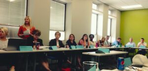 Jennifer Skala (standing, left) from Nebraska Children and Families Foundation guiding the group of child welfare advocates as they learn about the SFA and set goals for the upcoming recommendations.